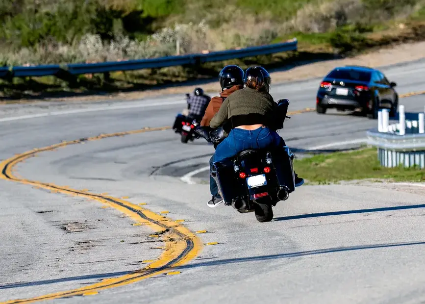 how to ride a motorcycle with a passenger